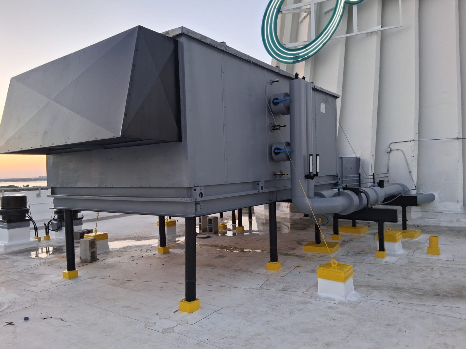 Rooftop air handling units mounted on steel stands